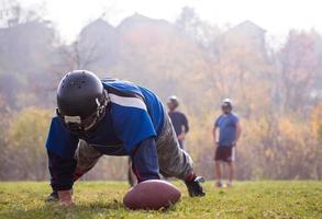 Amerikaans Amerikaans voetbal speler in actie foto