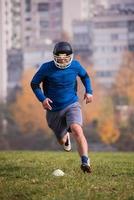 Amerikaans Amerikaans voetbal speler in actie foto