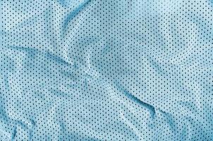 sport kleding kleding stof structuur achtergrond, top visie van licht blauw kleding textiel oppervlakte foto