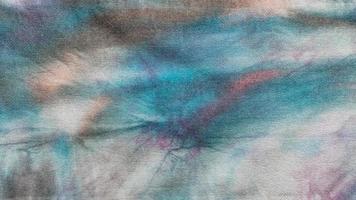 detail van met de hand gekleurd abstract batik Aan katoen kleding stof foto