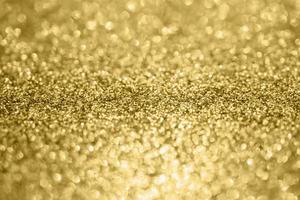 abstract vervagen goud schitteren fonkeling onscherp bokeh licht achtergrond foto