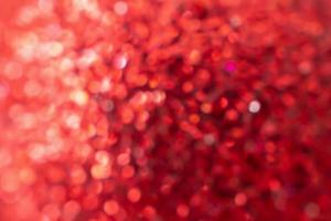 abstract vervagen rood schitteren fonkeling onscherp bokeh licht Kerstmis achtergrond foto