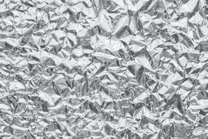 glanzend metaal zilvergrijs folie verfrommeld textuur achtergrond foto