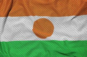 Niger vlag gedrukt Aan een polyester nylon- sportkleding maas kleding stof w foto