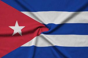 Cuba vlag is afgebeeld Aan een sport- kleding kleding stof met veel vouwen. sport team banier foto