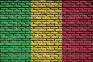 Mali vlag is geschilderd op een oud steen muur foto