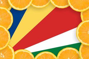 Seychellen vlag in vers citrus fruit plakjes kader foto