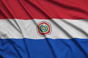 Paraguay vlag is afgebeeld Aan een sport- kleding kleding stof met veel vouwen. sport team banier foto