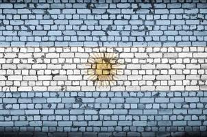 Argentinië vlag is geschilderd op een oud steen muur foto