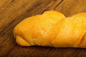 baguette Aan houten achtergrond foto