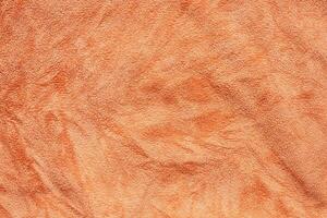 oranje handdoek kleding stof structuur oppervlakte dichtbij omhoog achtergrond foto