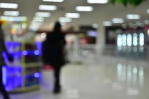 wazig beeld van boodschappen doen winkelcentrum interieur foto