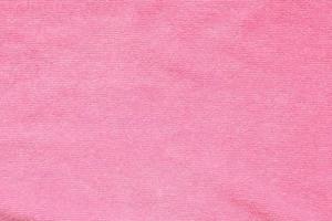 roze handdoek kleding stof structuur oppervlakte dichtbij omhoog achtergrond foto
