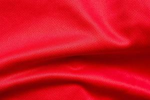 rood sport- kleding kleding stof Amerikaans voetbal overhemd Jersey structuur achtergrond foto