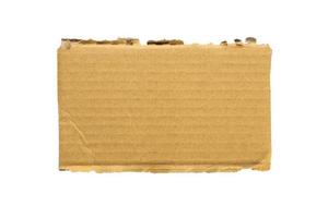 bruin karton papier stuk geïsoleerd Aan wit achtergrond foto
