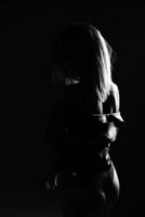 vrouw silhouet in lingerie zwart en wit foto