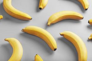 meetkundig patroon van geel bananen Aan een grijs achtergrond in de modieus kleuren van 2021. foto