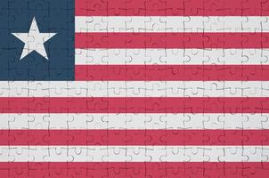 Liberia vlag is afgebeeld Aan een gevouwen puzzel foto