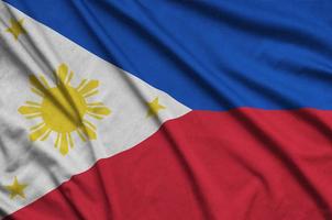 Filippijnen vlag is afgebeeld Aan een sport- kleding kleding stof met veel vouwen. sport team banier foto