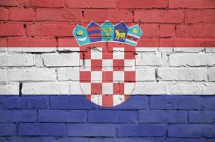 Kroatië vlag is geschilderd op een oud steen muur foto