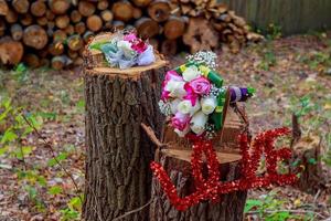 bruidsboeket en corsages van de bruidegom foto