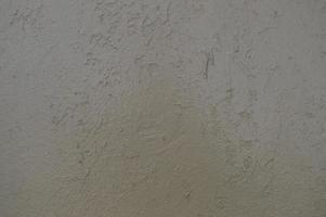 structuur van ijzer metaal geschilderd grijs pellen verf van oud gehavend gekrast gebarsten oude roestig metaal vel muur met corrosie. de achtergrond foto