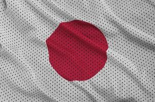 Japan vlag gedrukt Aan een polyester nylon- sportkleding maas kleding stof w foto