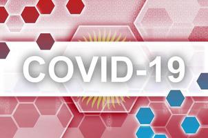 Kirgizië vlag en futuristische digitaal abstract samenstelling met covid-19 inscriptie. coronavirus het uitbreken concept foto
