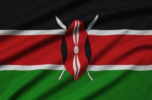 Kenia vlag is afgebeeld Aan een sport- kleding kleding stof met veel vouwen. sport team banier foto