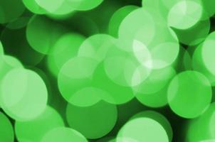 groen abstract Kerstmis wazig lichtgevend achtergrond. onscherp artistiek bokeh lichten beeld foto