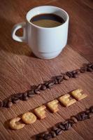 Engels woord koffie, gemaakt omhoog van zout kraker brieven foto