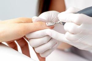 manicure meester toepassingen een elektrisch nagel machine foto