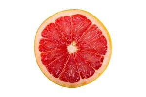 Schijfje grapefruit geïsoleerd op een witte achtergrond foto