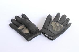vuil oud zwart handschoenen. foto