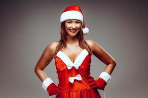 vrouw de kerstman claus foto