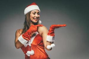 vrouw de kerstman claus foto