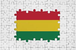 Bolivia vlag in kader van wit puzzel stukken met missend centraal een deel foto