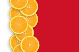 Bahrein vlag en citrus fruit plakjes verticaal rij foto