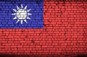 Taiwan vlag is geschilderd op een oud steen muur foto