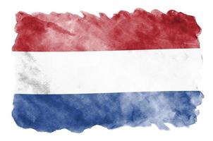 Nederland vlag is afgebeeld in vloeistof waterverf stijl geïsoleerd Aan wit achtergrond foto
