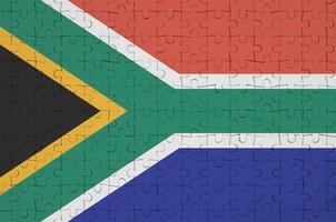 zuiden Afrika vlag is afgebeeld Aan een gevouwen puzzel foto