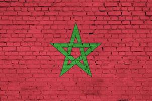 Marokko vlag is geschilderd op een oud steen muur foto