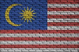Maleisië vlag is geschilderd op een oud steen muur foto