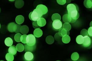 groen abstract Kerstmis wazig lichtgevend achtergrond. onscherp artistiek bokeh lichten beeld foto