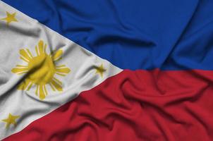 Filippijnen vlag is afgebeeld Aan een sport- kleding kleding stof met veel vouwen. sport team banier foto
