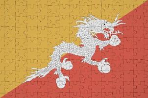 Bhutan vlag is afgebeeld Aan een gevouwen puzzel foto