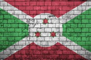 Burundi vlag is geschilderd op een oud steen muur foto