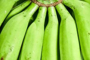 detailopname van vers groen onrijp banaan foto