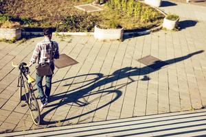 knap Mens met fiets foto