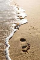 voetafdruk in het zand foto